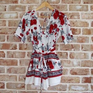 Women's Trixxi white and red floral v neck short romper, size S